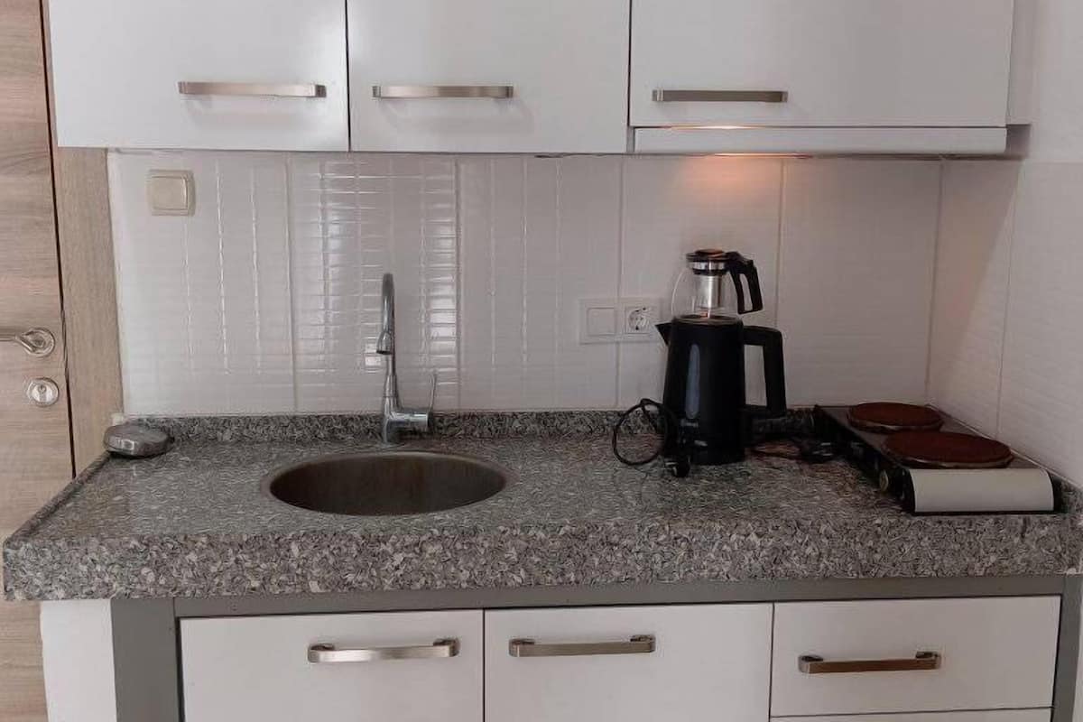 comfort apartment, 2 bedrooms, kitchenette | private kitchen | fridge, microwave, stovetop, coffee/tea maker