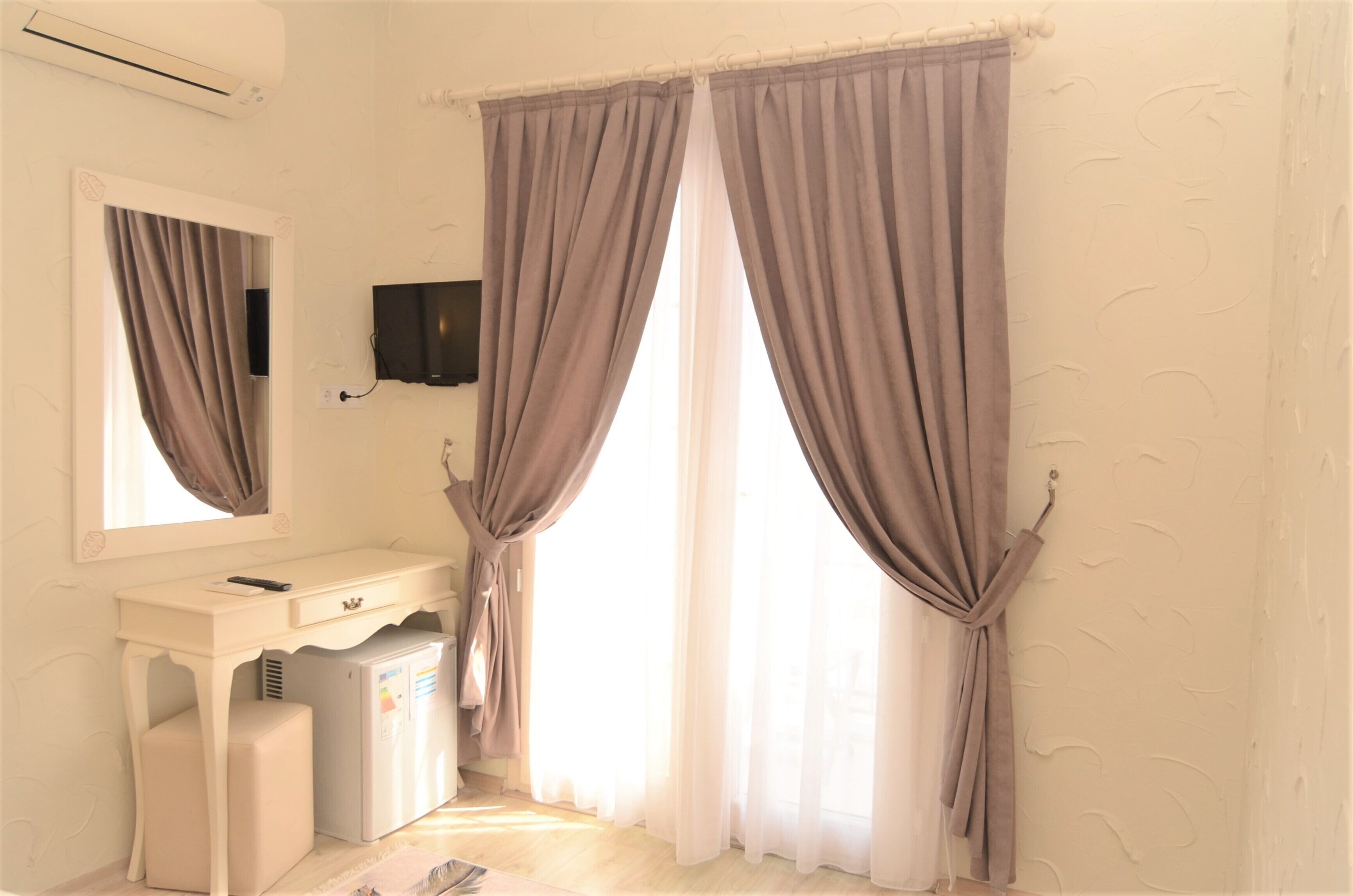 royal room | 1 bedroom, premium bedding, minibar, in-room safe