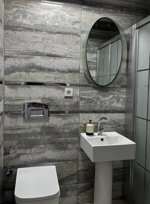 Standard Double Room | Bathroom | Shower, free toiletries, hair dryer, slippers