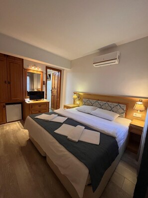 Quarto econômico | 1 quarto, frigobar, ferros/tábuas de passar roupa, Wi-Fi de cortesia