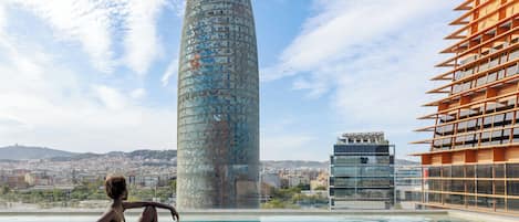 Seasonal outdoor pool, open 9:00 AM to 7:00 PM, sun loungers