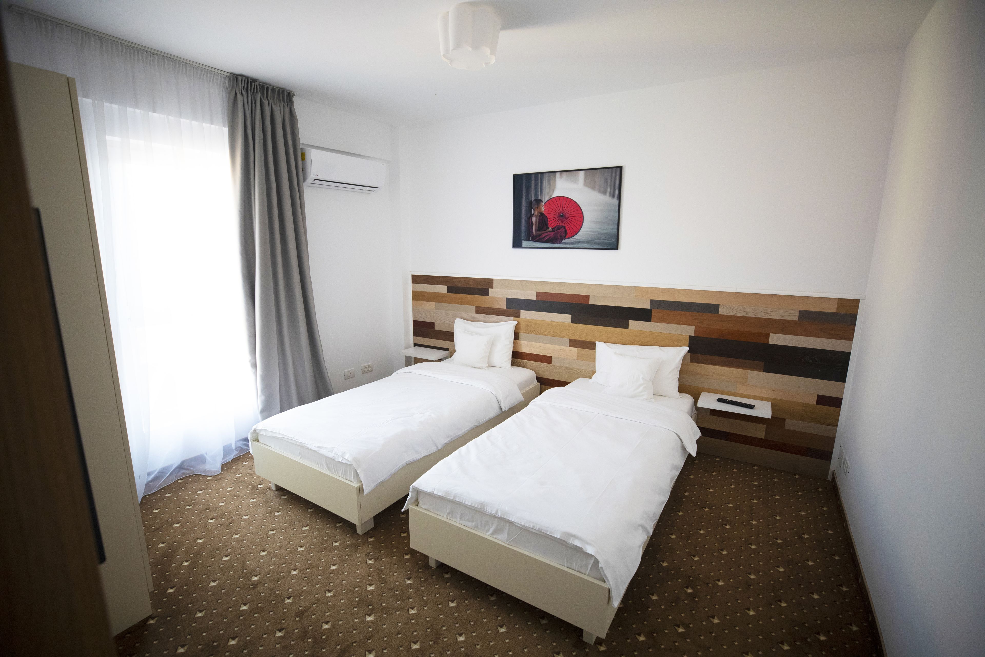 classic double room single use, 2 single beds | living room | flat-screen tv