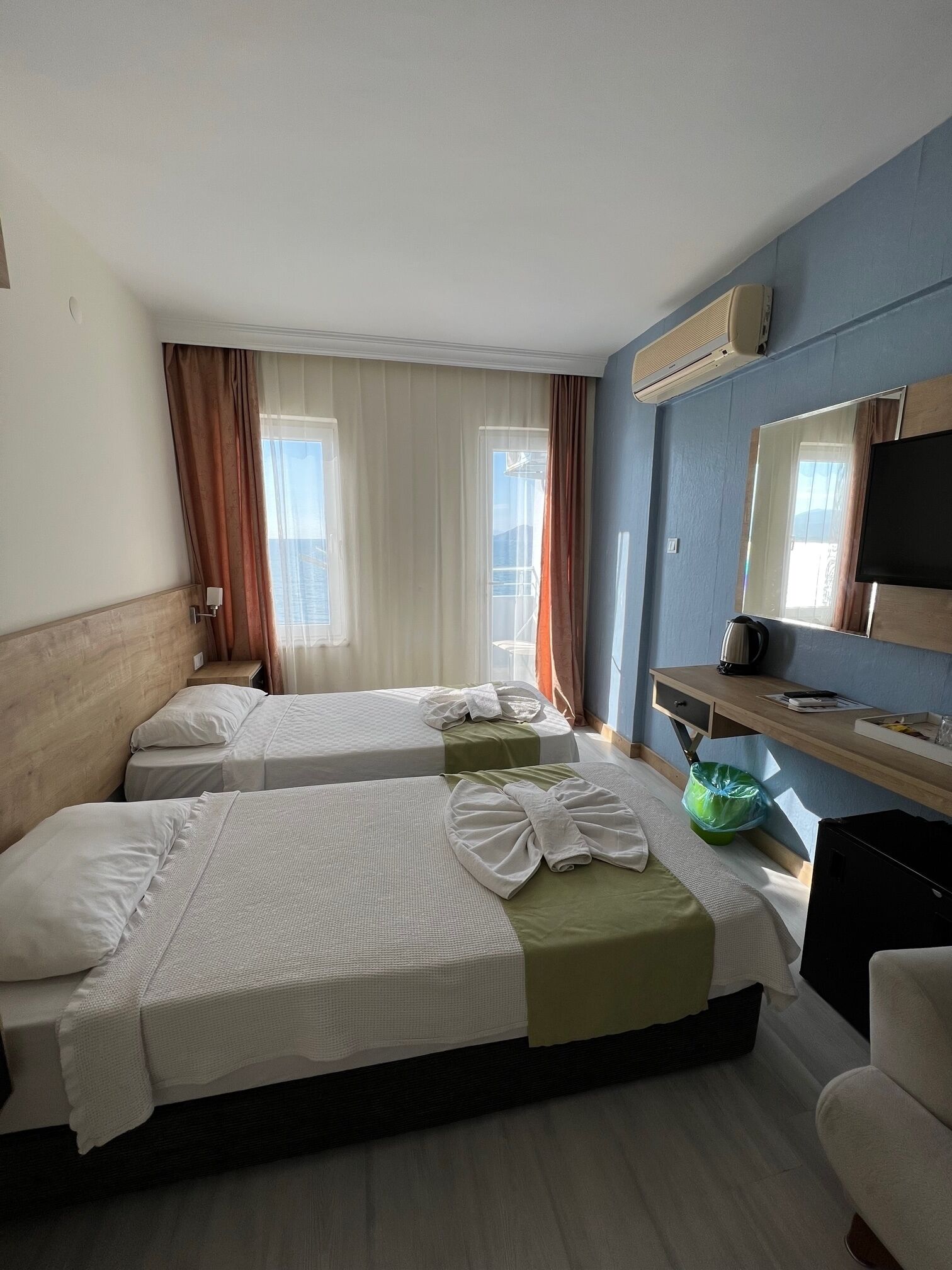 family room | minibar, desk, laptop workspace, blackout curtains