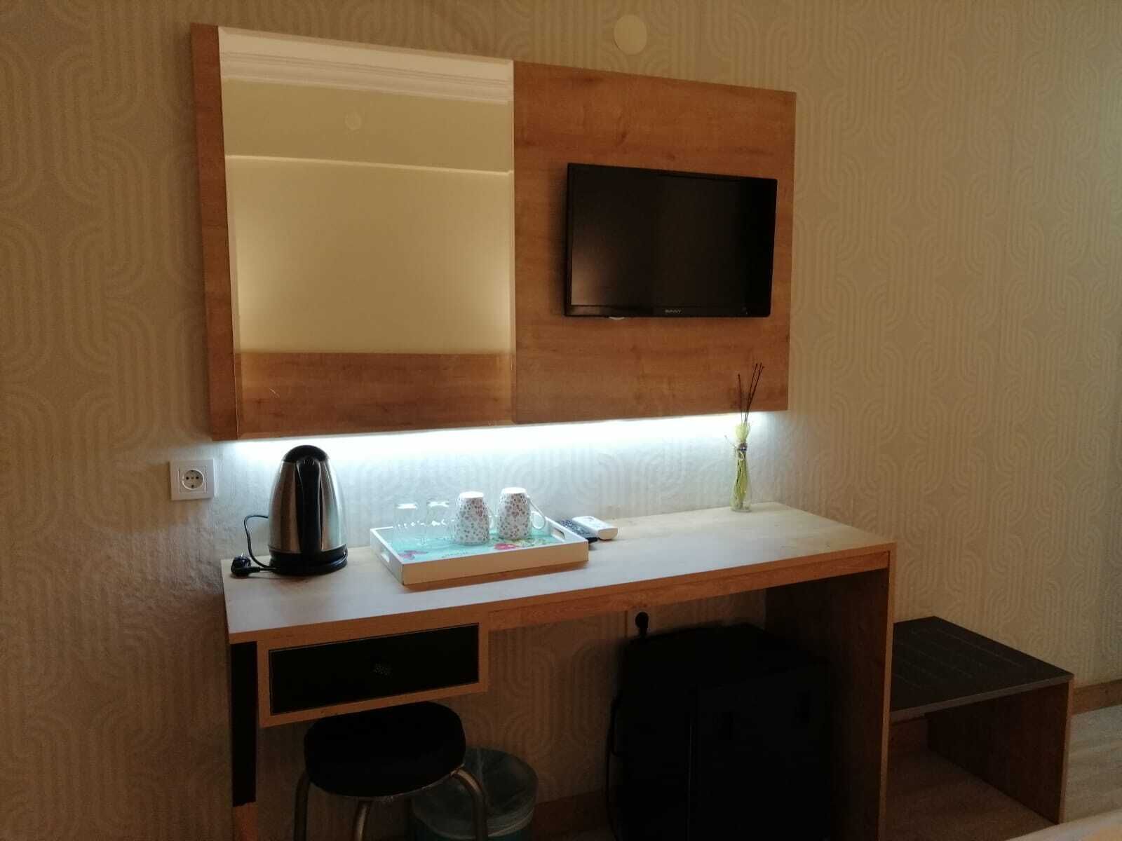 minibar, desk, laptop workspace, blackout curtains