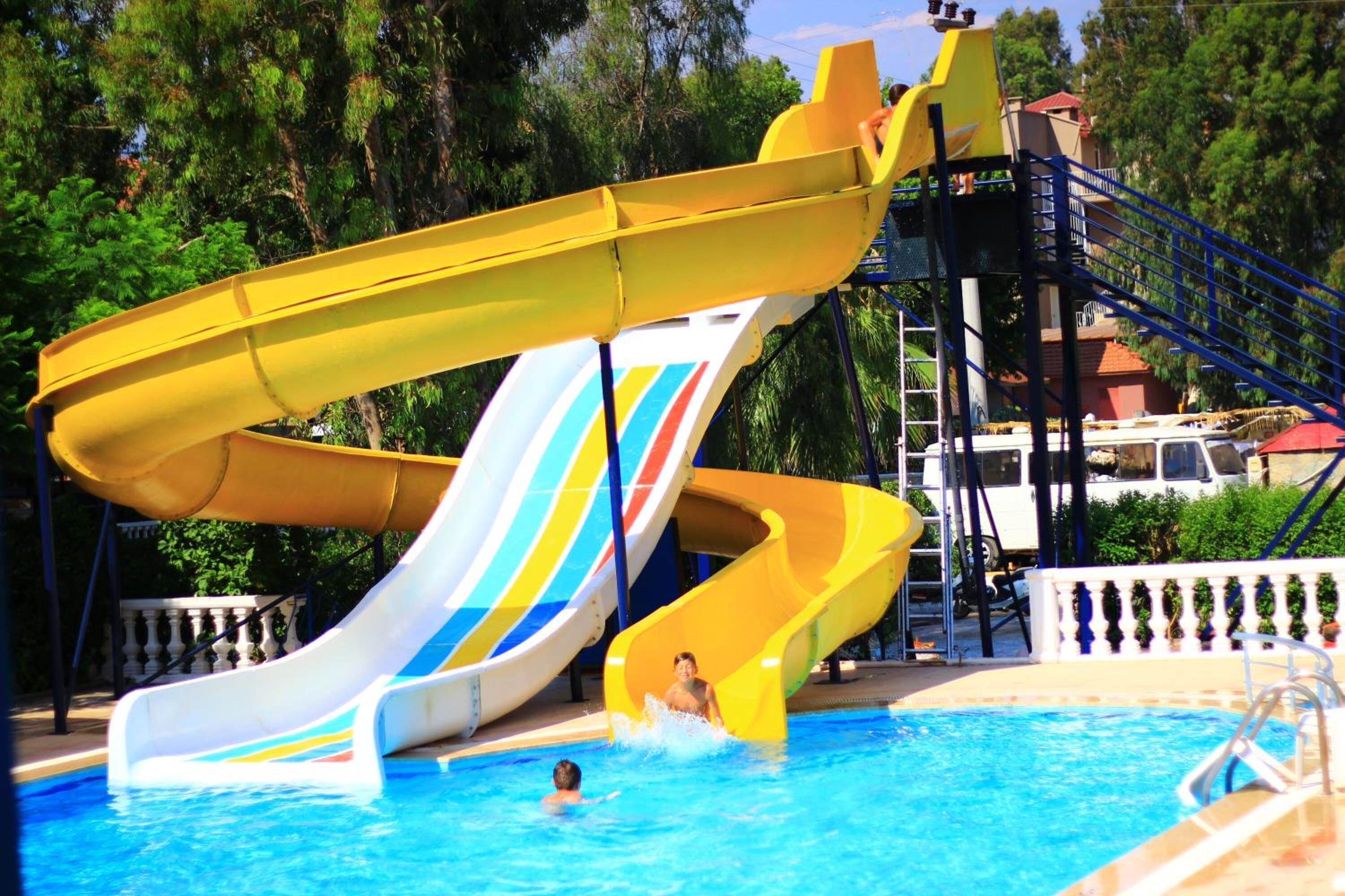 outdoor pool, pool umbrellas, pool loungers