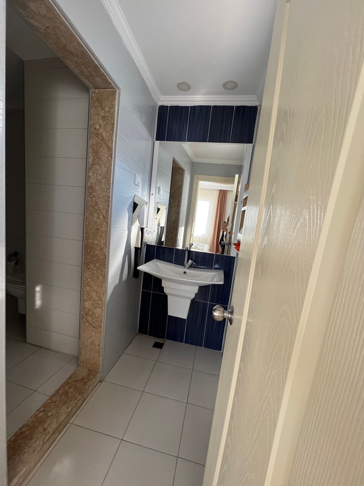 family room | bathroom | shower, free toiletries, hair dryer, towels