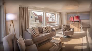 Deluxe Apartment, 2 Bedrooms | Living room | 40-inch Smart TV with digital channels, TV