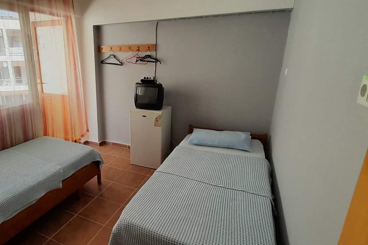 Economy Twin Room | In-room safe, free WiFi, bed sheets