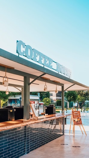 4 bars/lounges, poolside bar, beach bar