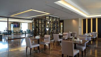 Breakfast, lunch, dinner served; international cuisine