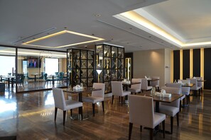 Breakfast, lunch, dinner served; international cuisine