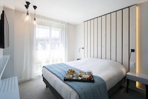 Ropa de cama de alta calidad y minibar