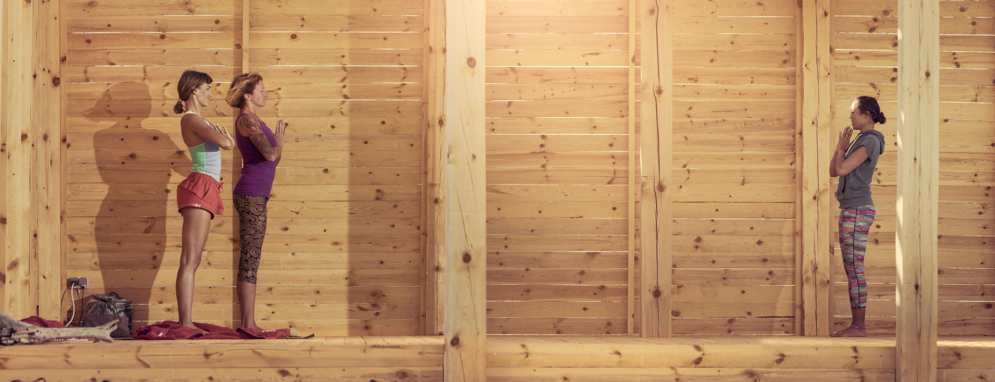 A room with wooden panel walls and a window.