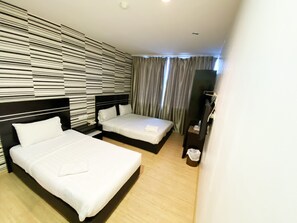 Family Room | Desk, iron/ironing board, free WiFi, bed sheets - Bluebell Hotel (Johor Bahru)