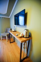 Suíte família, terraço, vista para o mar | Roupas de cama premium, edredons de pluma, frigobar