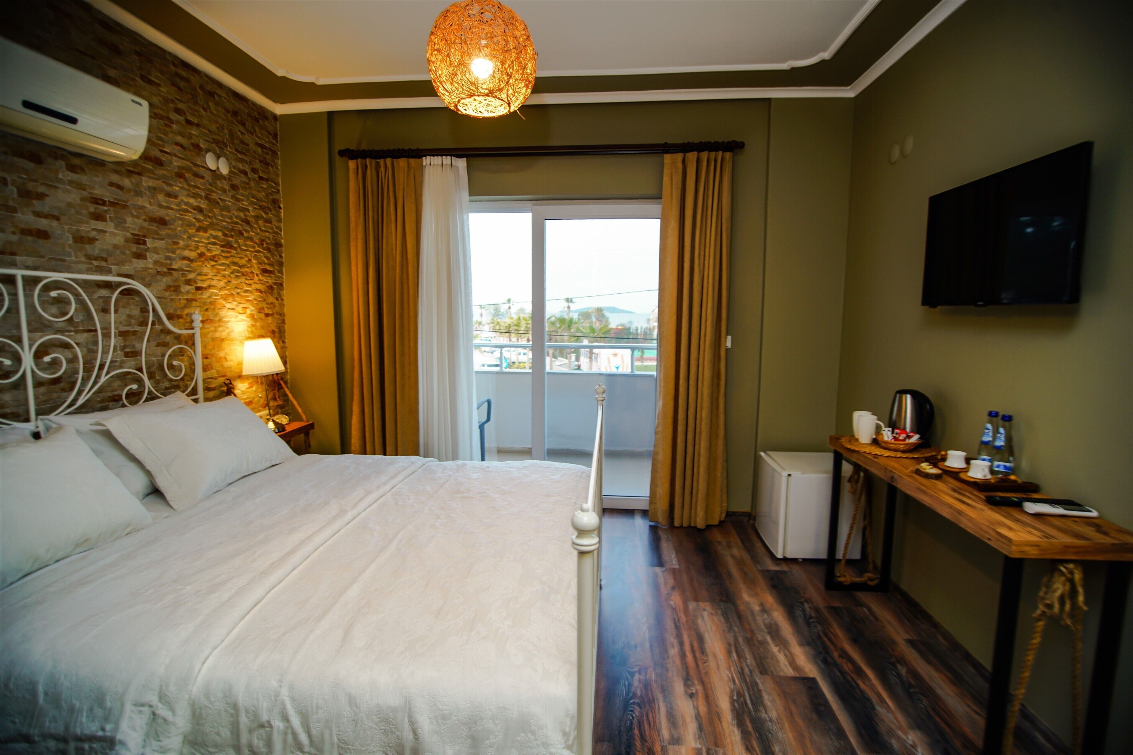 deluxe room, multiple beds, non smoking, sea view | premium bedding, down duvets, minibar, individually decorated