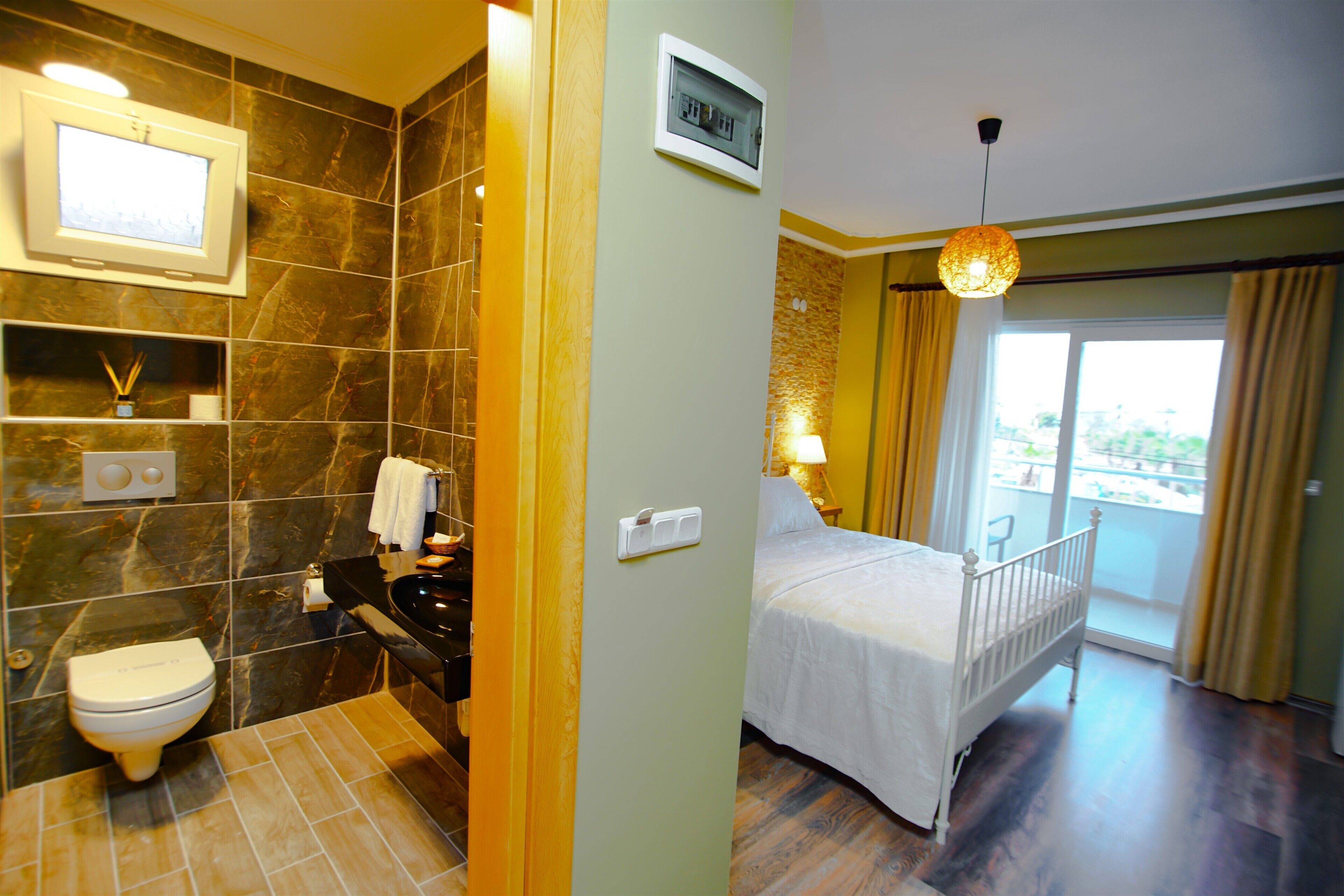 deluxe room, multiple beds, non smoking, sea view | premium bedding, down duvets, minibar, individually decorated