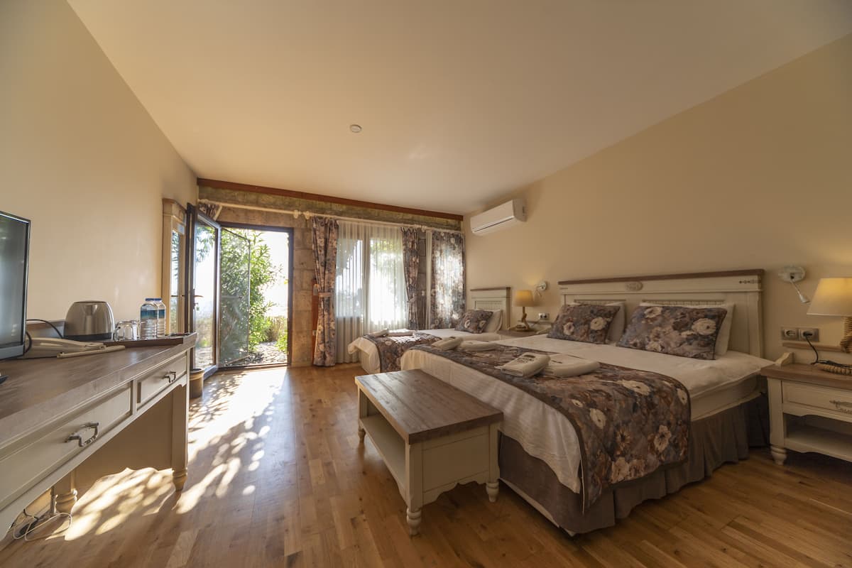 Family Triple Room, Sea View | 1 bedroom, premium bedding, minibar, in-room safe