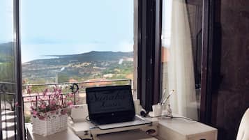Suite, Sea View | 1 bedroom, premium bedding, minibar, in-room safe