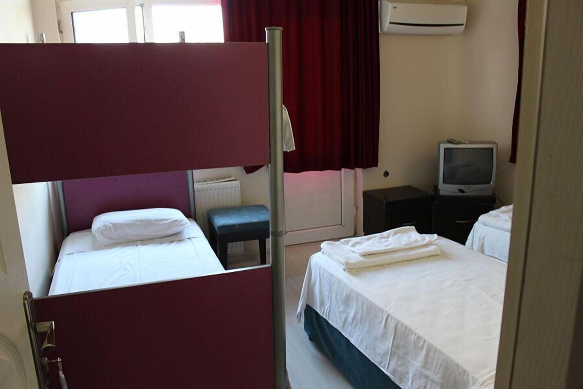 Quarto quádruplo | Wi-Fi de cortesia, roupa de cama