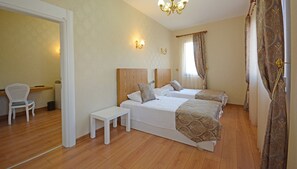 Family Room | Minibar, in-room safe, soundproofing, free cribs/infant beds