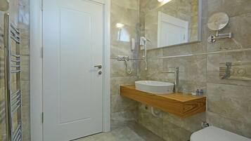 Shower, free toiletries, hair dryer, slippers