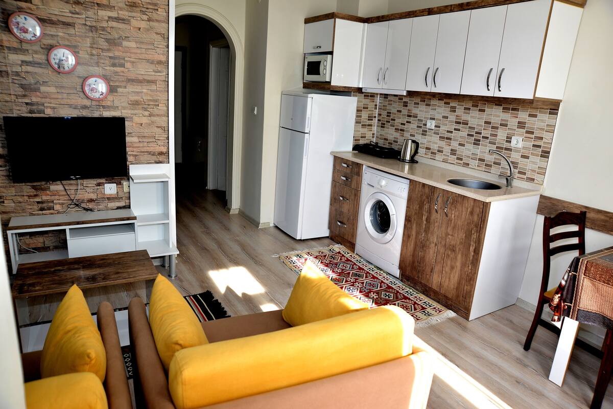 Departamento Deluxe, 1 habitación, cocina, vista a la ciudad | Ropa de cama de alta calidad y caja de seguridad en la habitación