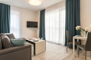 Apartamento, 1 habitación (4 people) | Zona de estar | Una televisión de pantalla plana