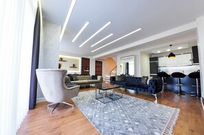 55-inch flat-screen TV with cable channels, LCD TV, fireplace