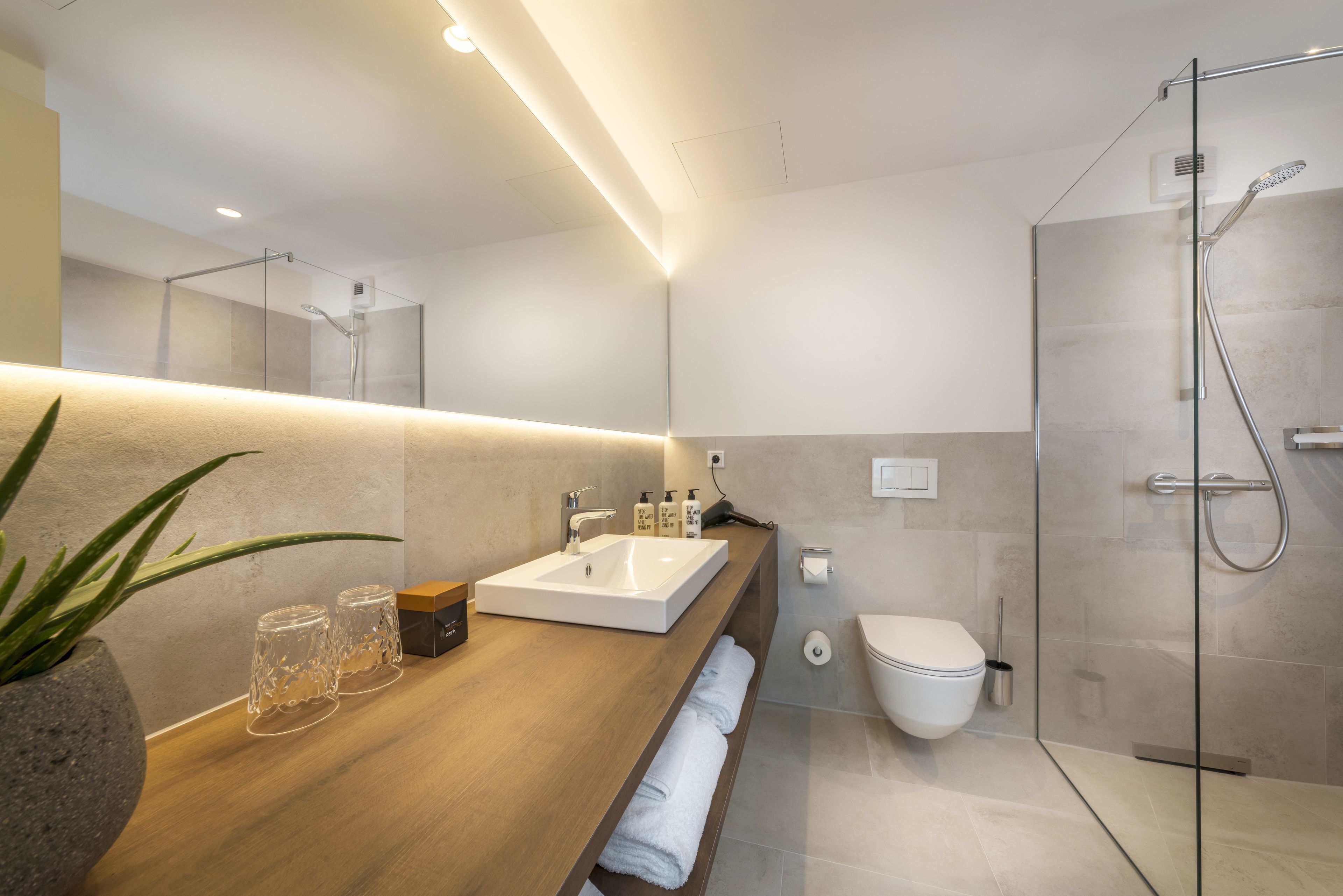 shower, free toiletries, hair dryer, bathrobes