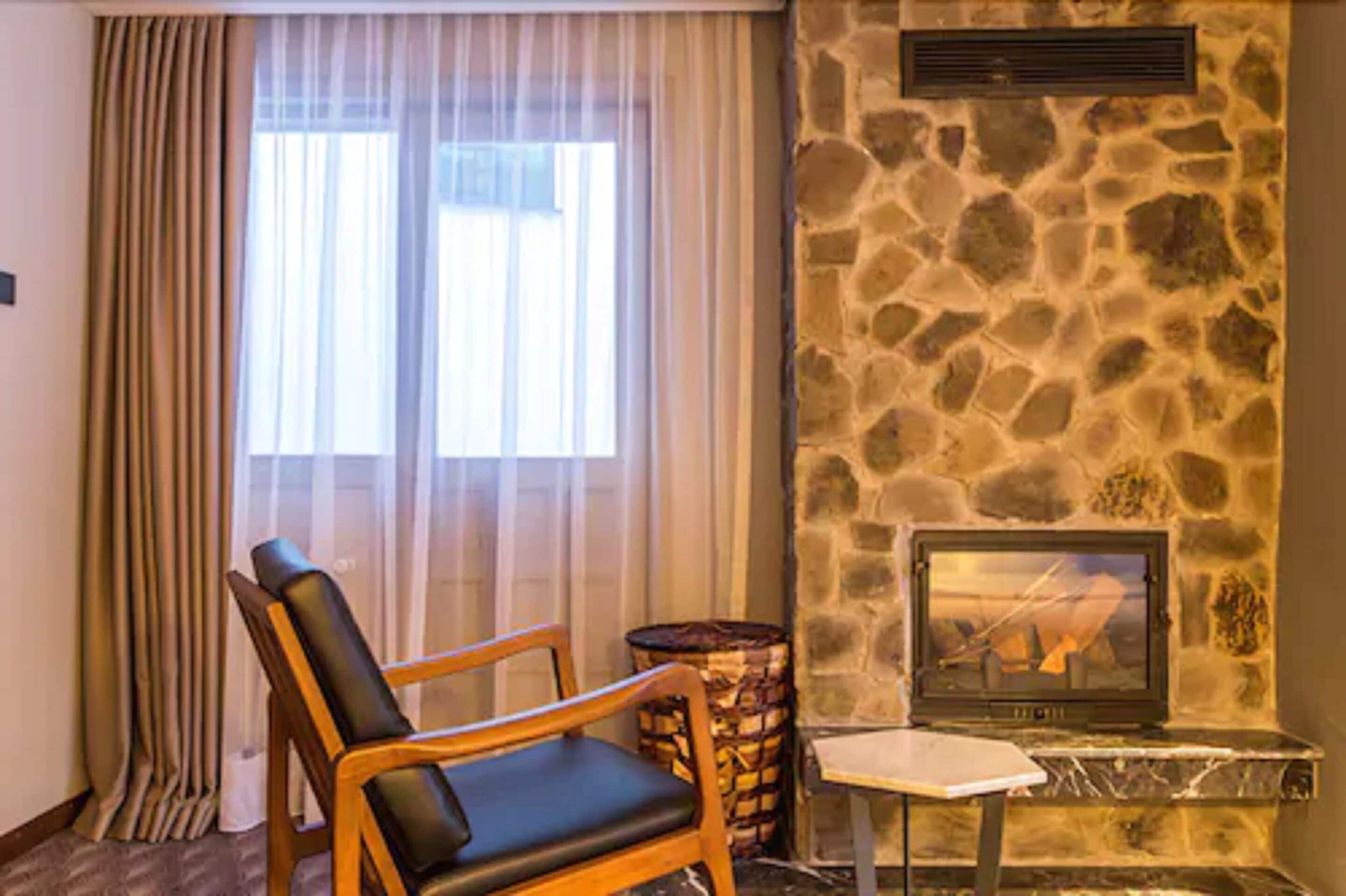 deluxe room, jetted tub | living area | lcd tv