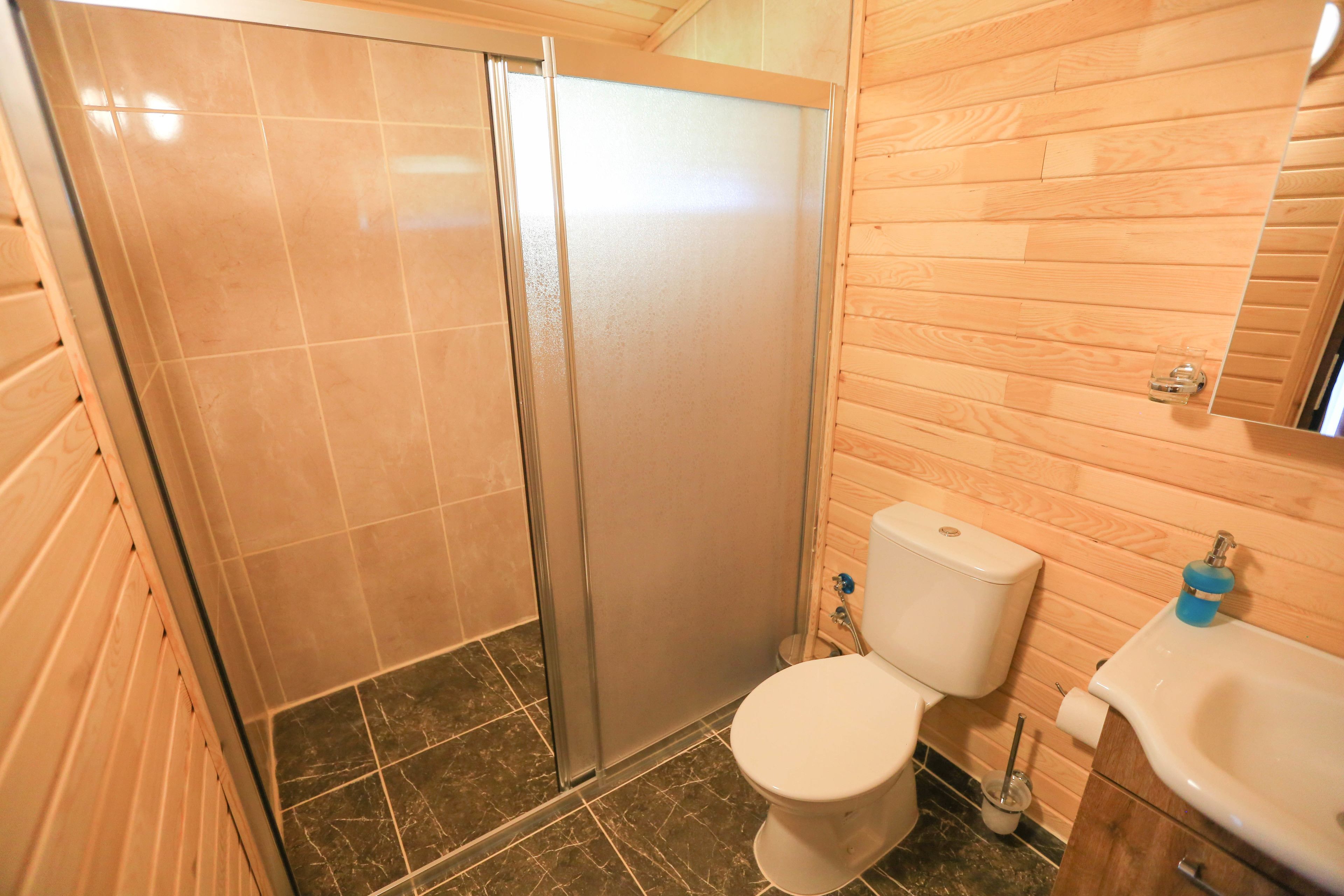 economy room, 1 double bed with sofa bed, garden view | bathroom | shower, rainfall showerhead, hair dryer, slippers