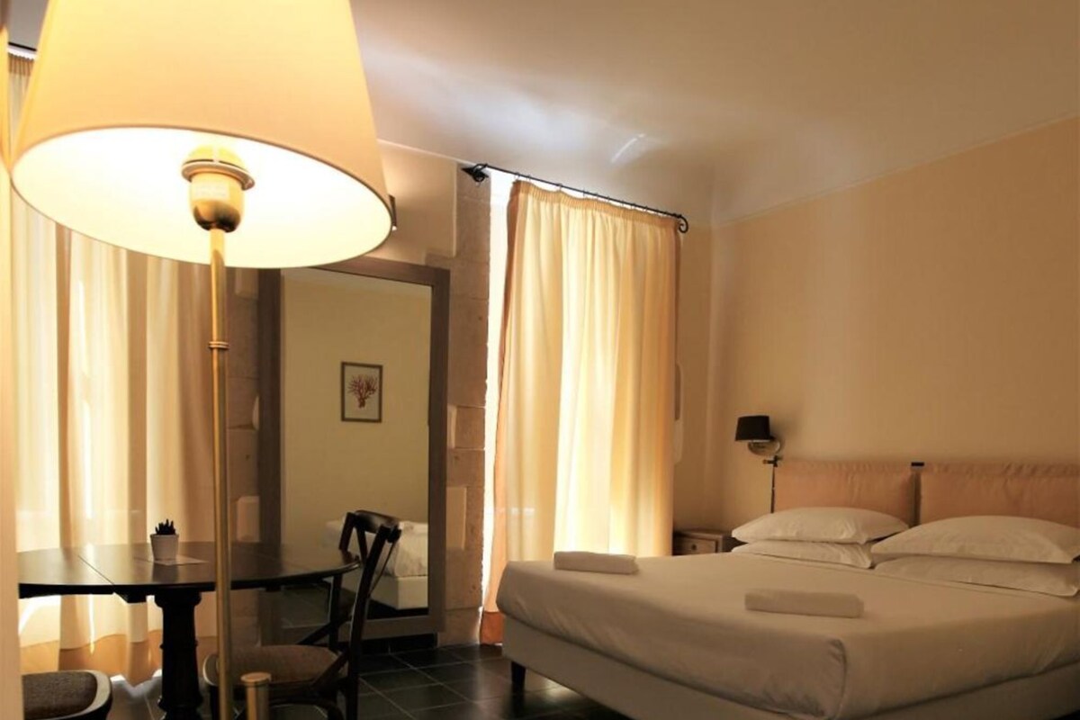 Premium bedding, down comforters, minibar, in-room safe