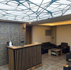 Premium bedding, desk, laptop workspace, soundproofing