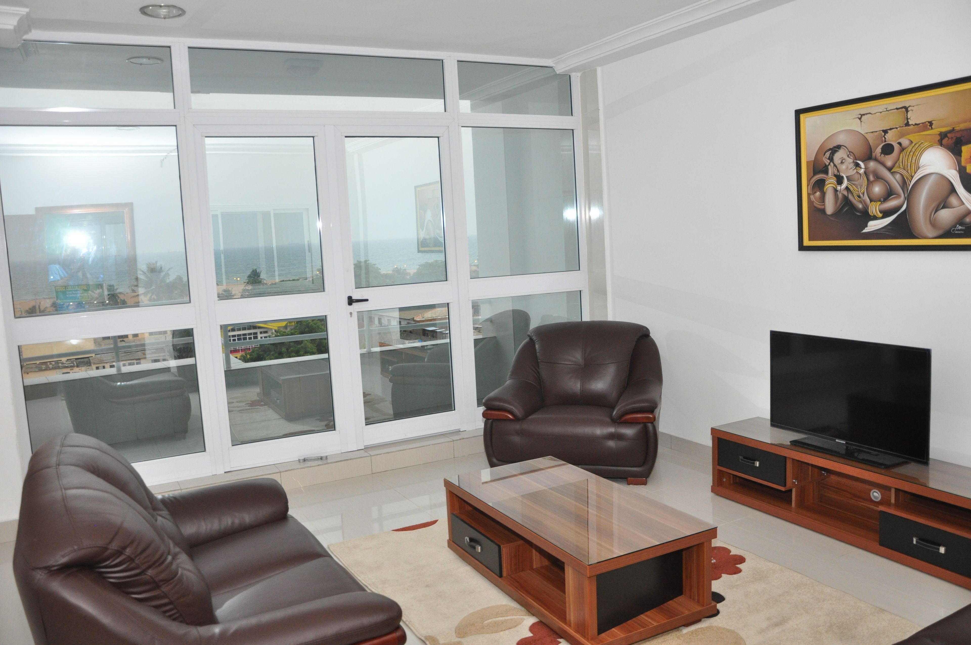 Suite (Gauguin) | Living room | 42-inch flat-screen TV with satellite channels, TV