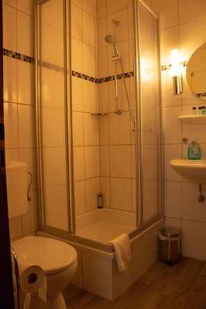 Shower, free toiletries, hair dryer, towels