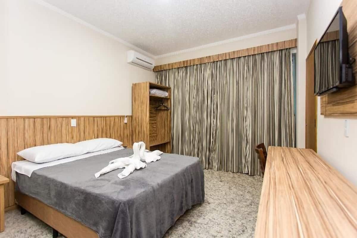 Een kluis op de kamer, verduisterende gordijnen, gratis wifi, beddengoed