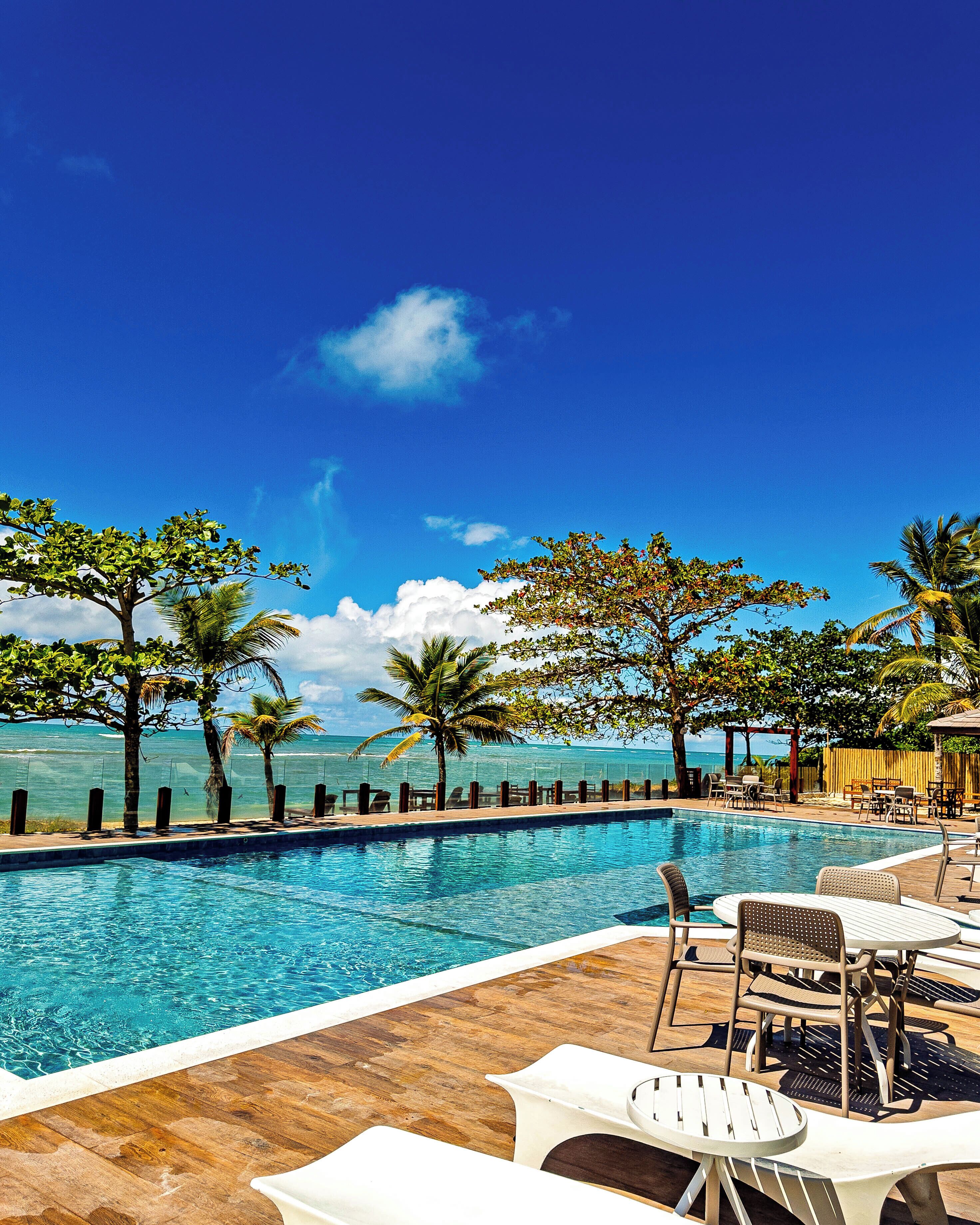 outdoor pool, pool umbrellas, pool loungers