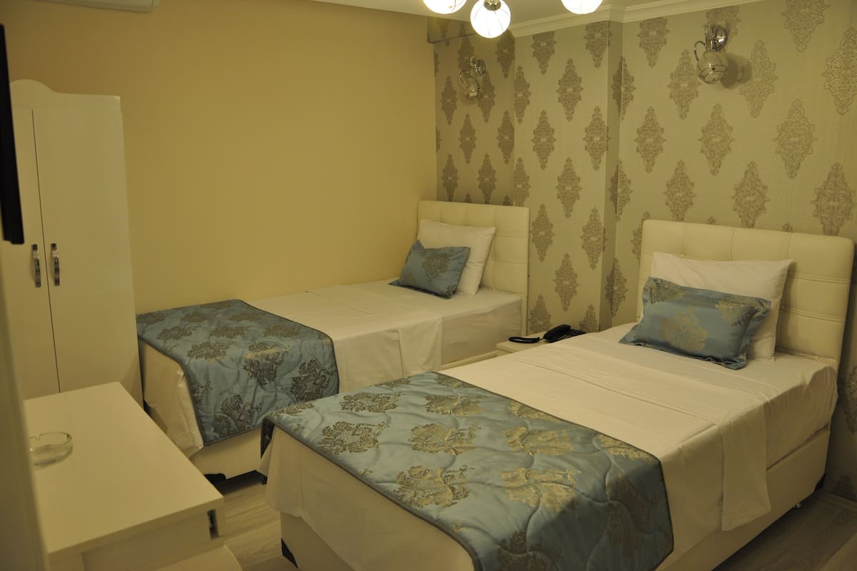 Economy-Zweibettzimmer