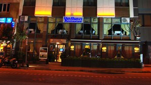 A hotel named "Hotel Marina" with a visible restaurant sign "Yellow Restaurant" below. - Hotel Villa Marina (Bandirma)