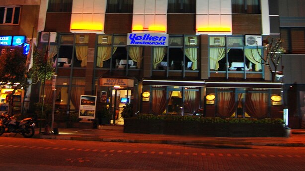 A hotel named "Hotel Marina" with a visible restaurant sign "Yellow Restaurant" below. - Hotel Villa Marina (Bandirma)