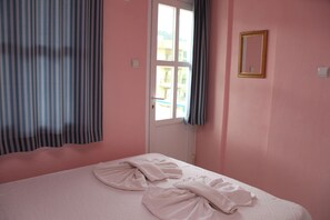 Basic Double Room, Garden Area | Iron/ironing board, free WiFi, bed sheets