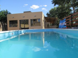 Outdoor pool, open 11:00 AM to 8:00 PM, sun loungers