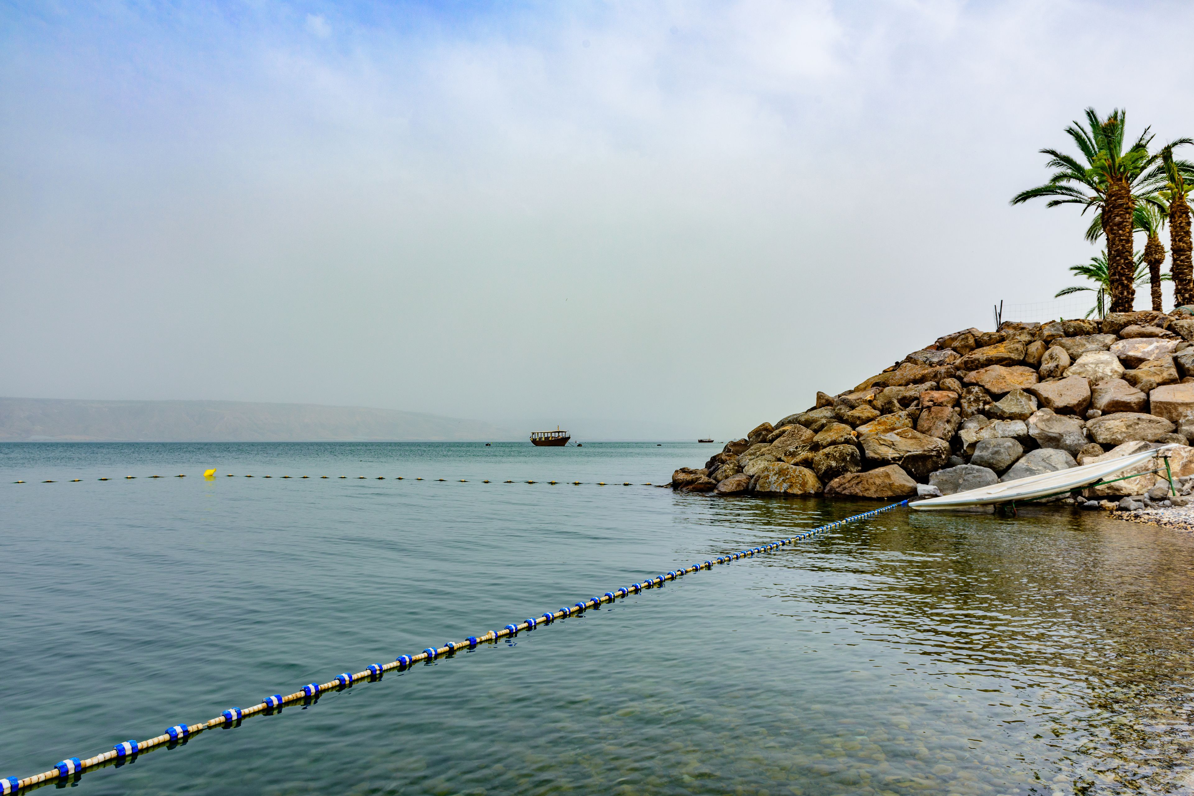 private beach, sun-loungers, beach towels