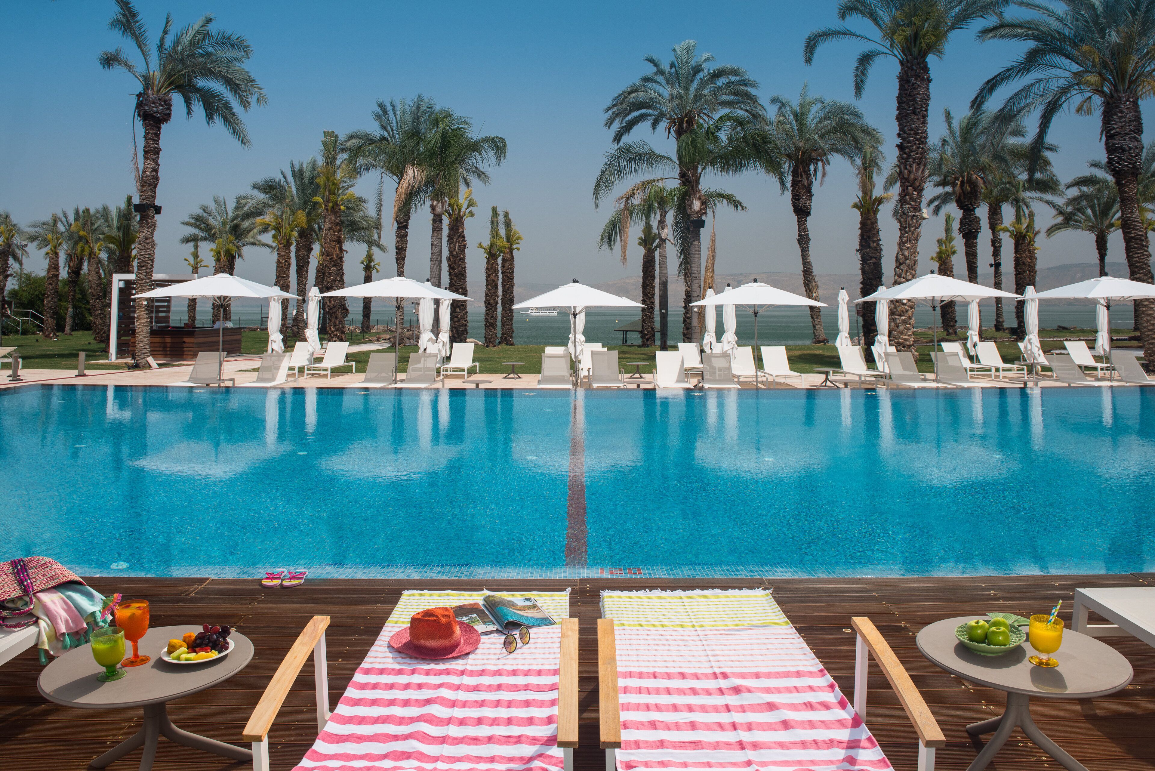 outdoor pool, open 9:00 am to 6:00 pm, pool loungers