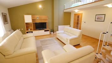 Deluxe Apartment, 3 Bedrooms, 2 Bathrooms, Sea Facing | Living area | Flat-screen TV