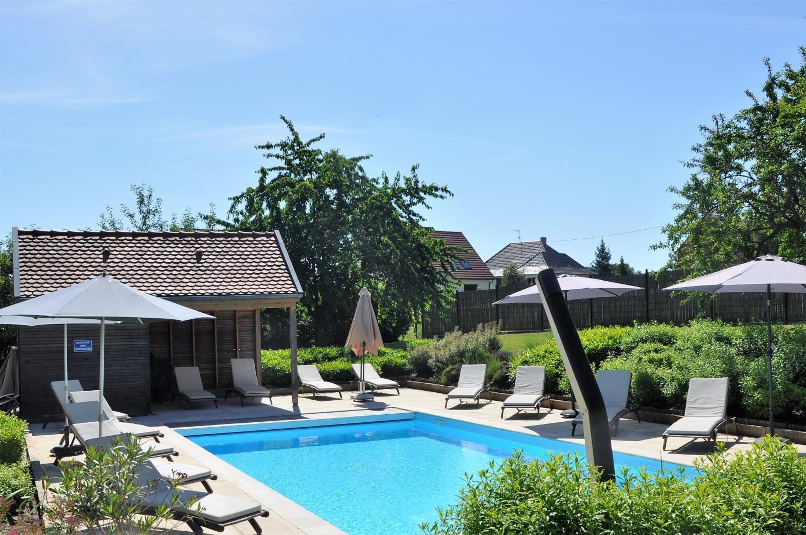 outdoor pool, pool loungers