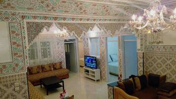 Apartemen | Ruang keluarga | TV layar datar