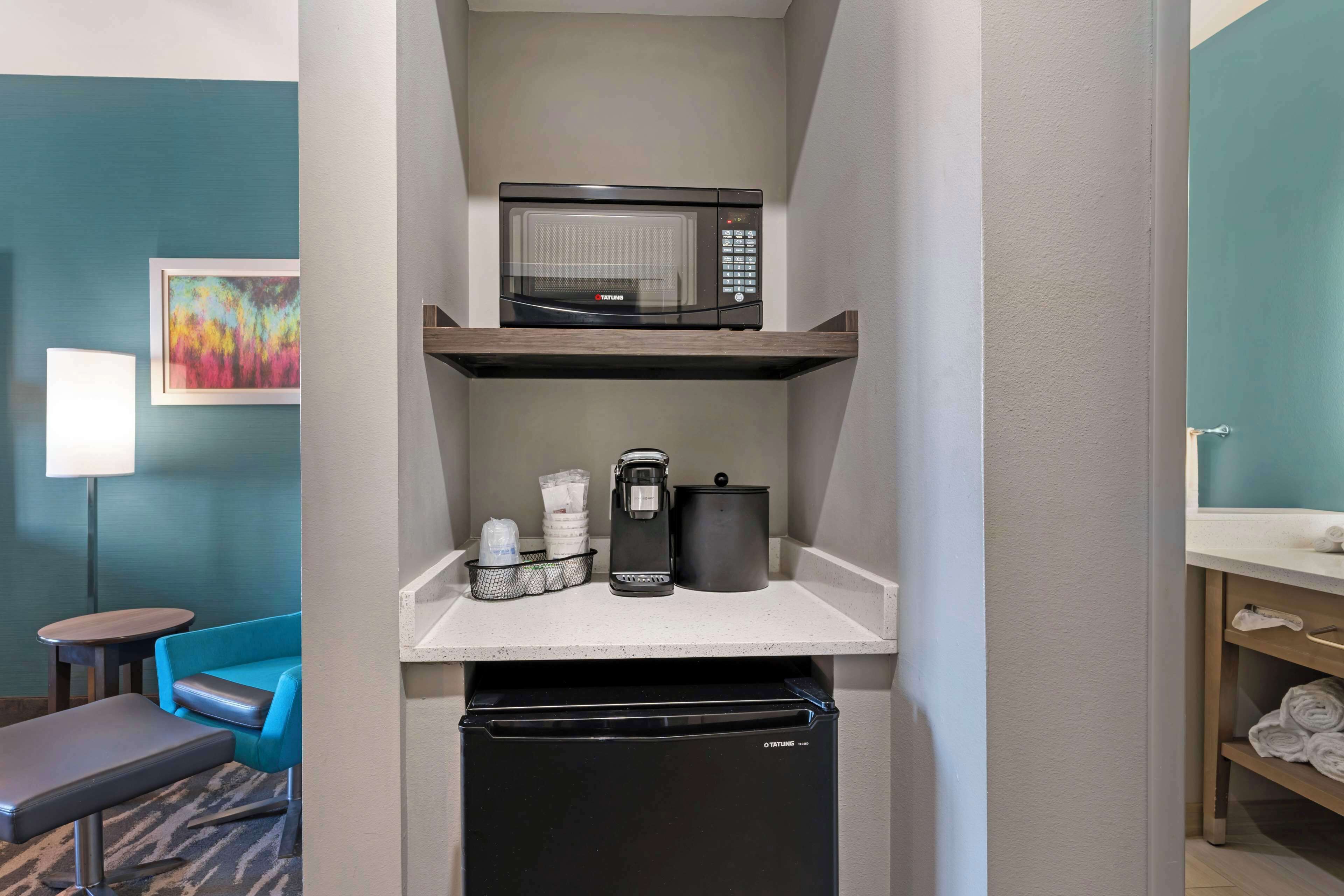 desk, laptop workspace, blackout curtains, iron/ironing board