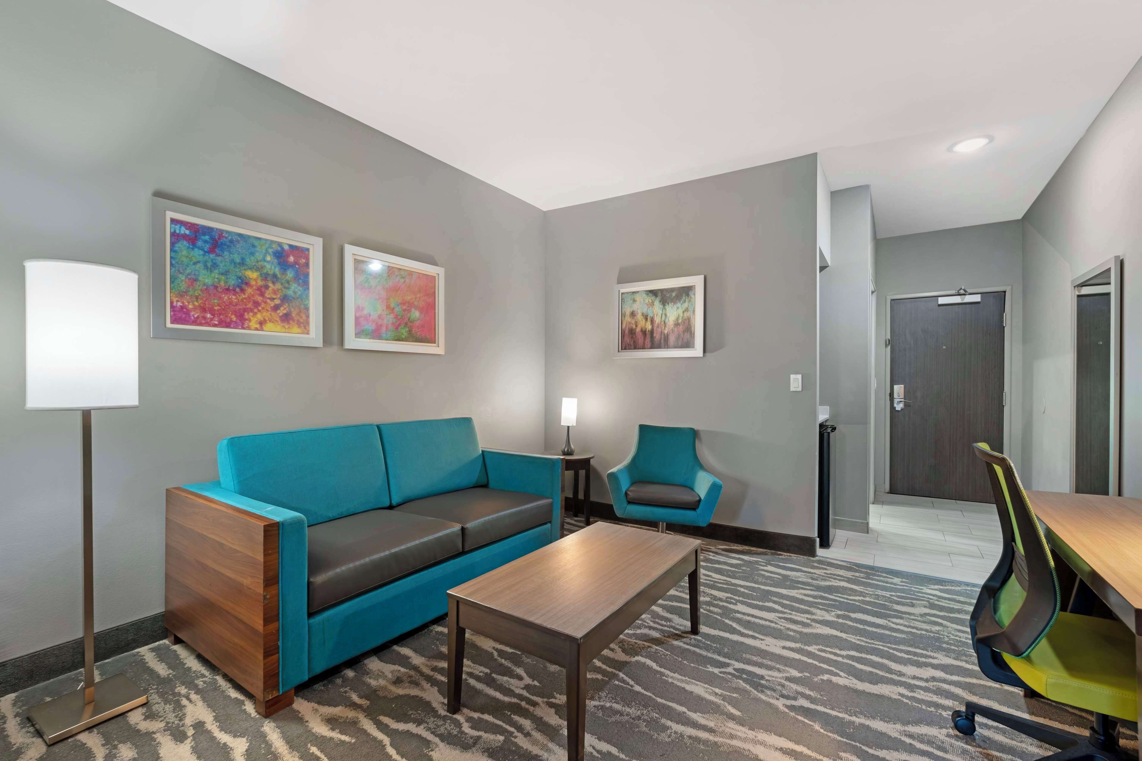 desk, laptop workspace, blackout curtains, iron/ironing board